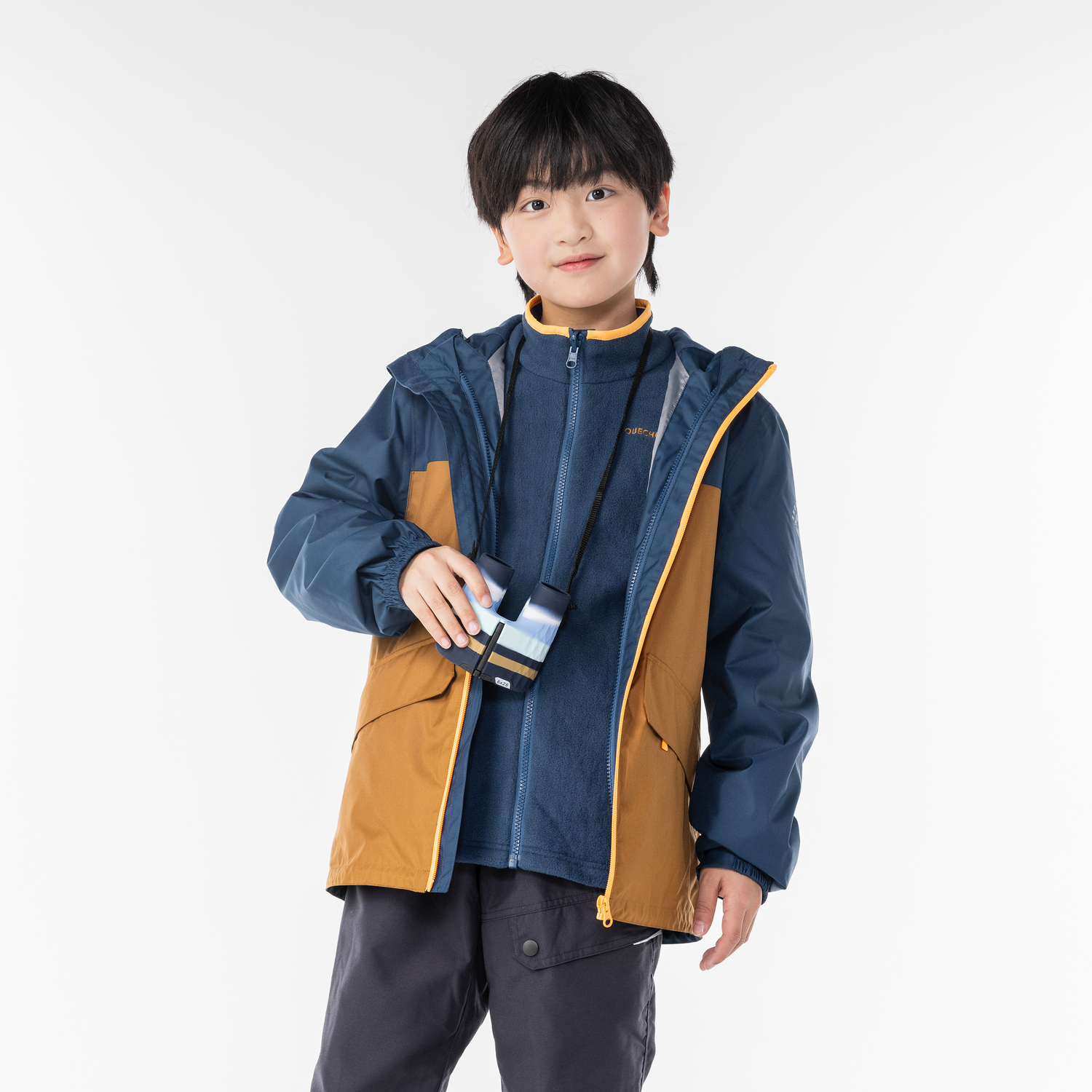 

Детская трёхслойная трекинговая куртка Quechua NH100 коричнево-синяя