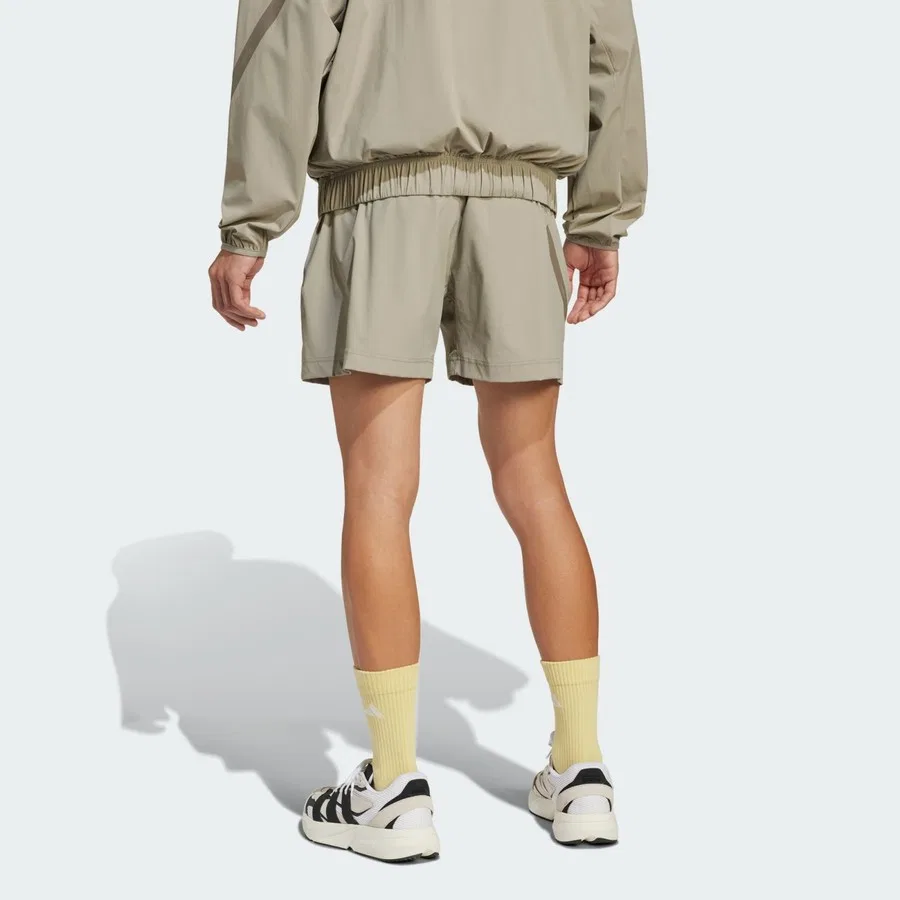 Спортивные шорты с боковыми карманами adidas Z.N.E. Woven Shorts, Бежевый — фото 2