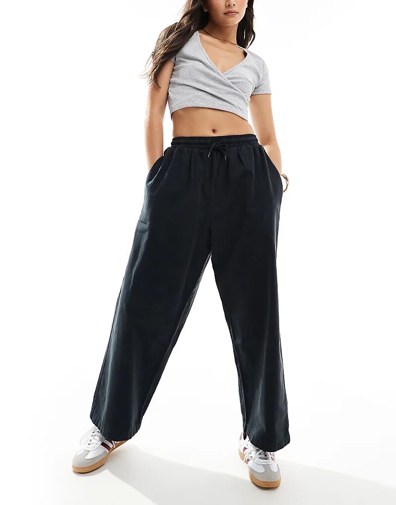 

Свободные брюки-бочки черного цвета ASOS DESIGN