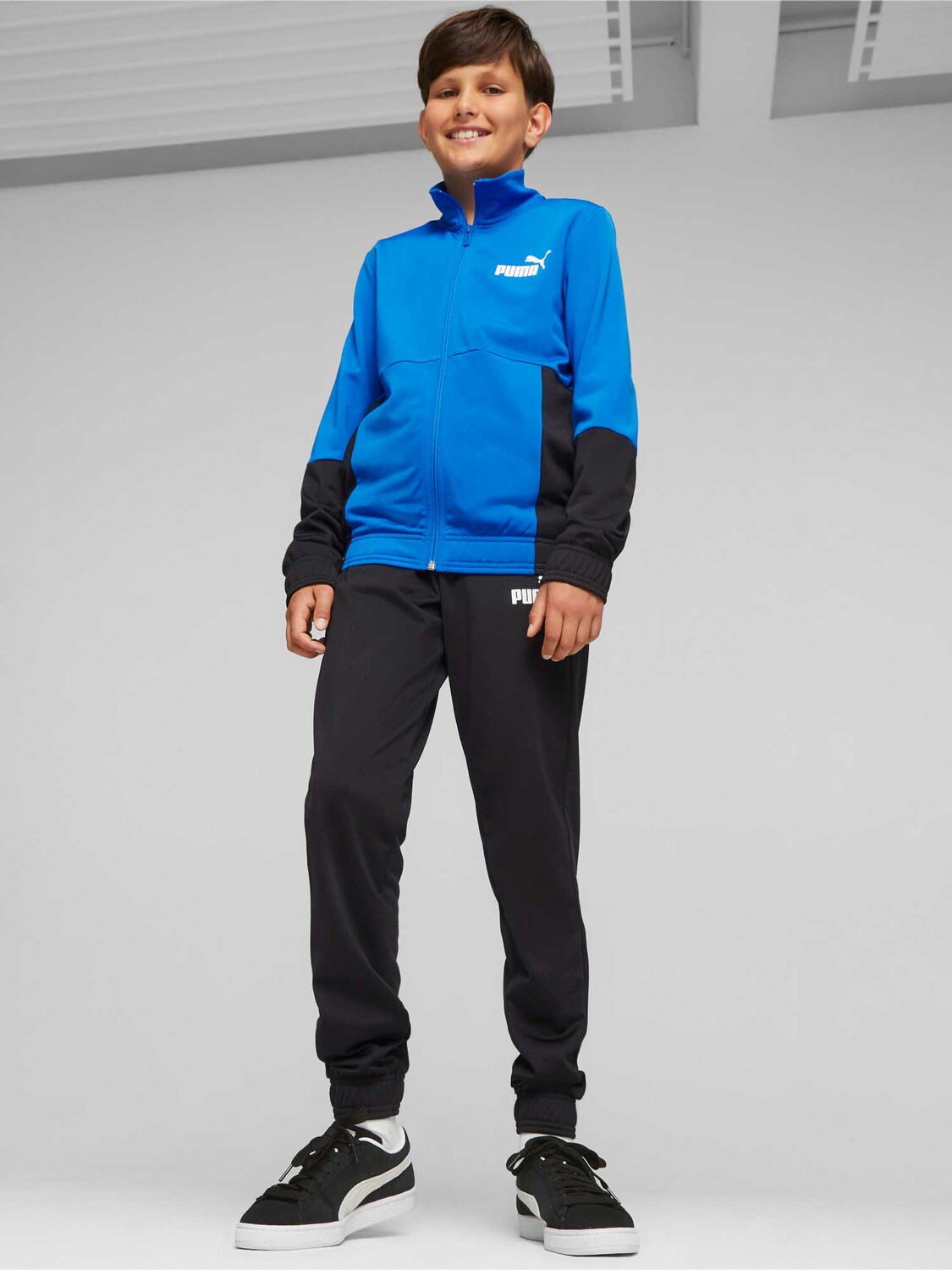 

Спортивный костюм Puma Colorblock Poly Suit cl B, синий