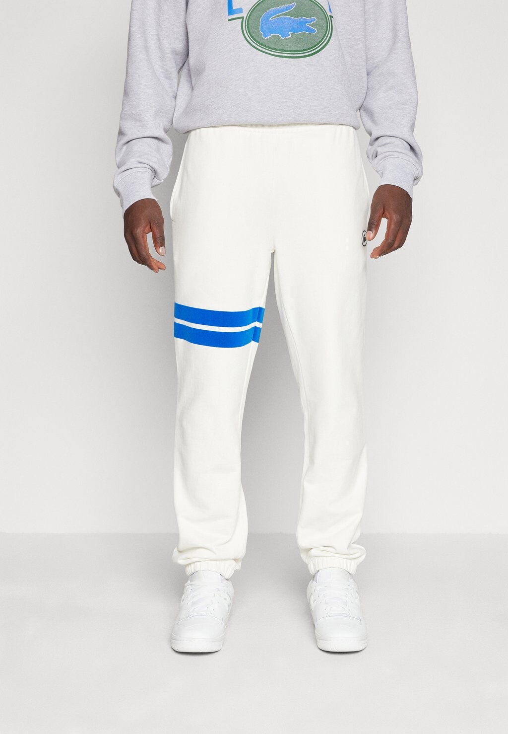 

Спортивные брюки FRENCH ICONICS TRACKPANT Lacoste, крем