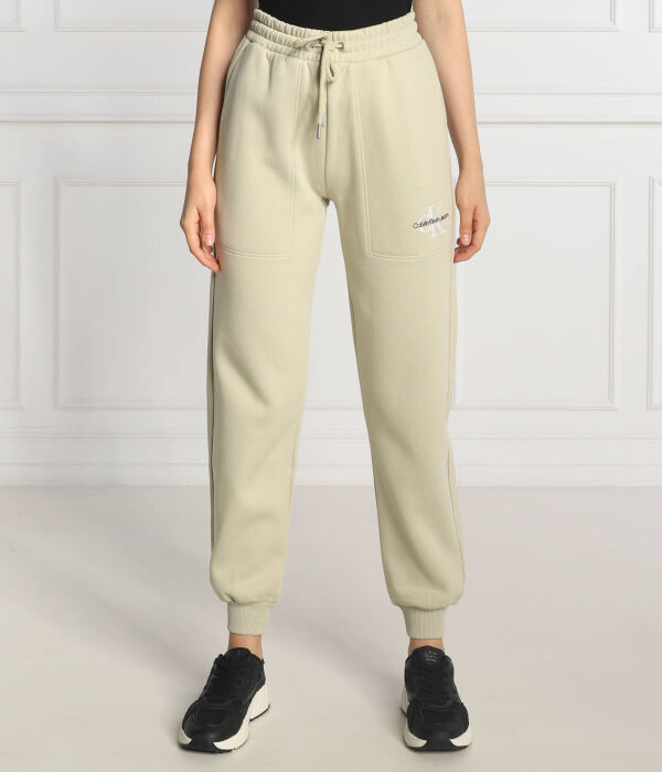 

Спортивные штаны женские Calvin Klein Jeans джоггеры на кулиске, зеленый