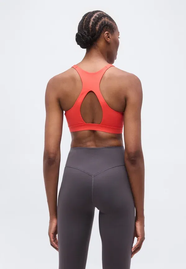 Бюстгальтер для фитнеса Nike Performance, light crimson/university red — фото 3