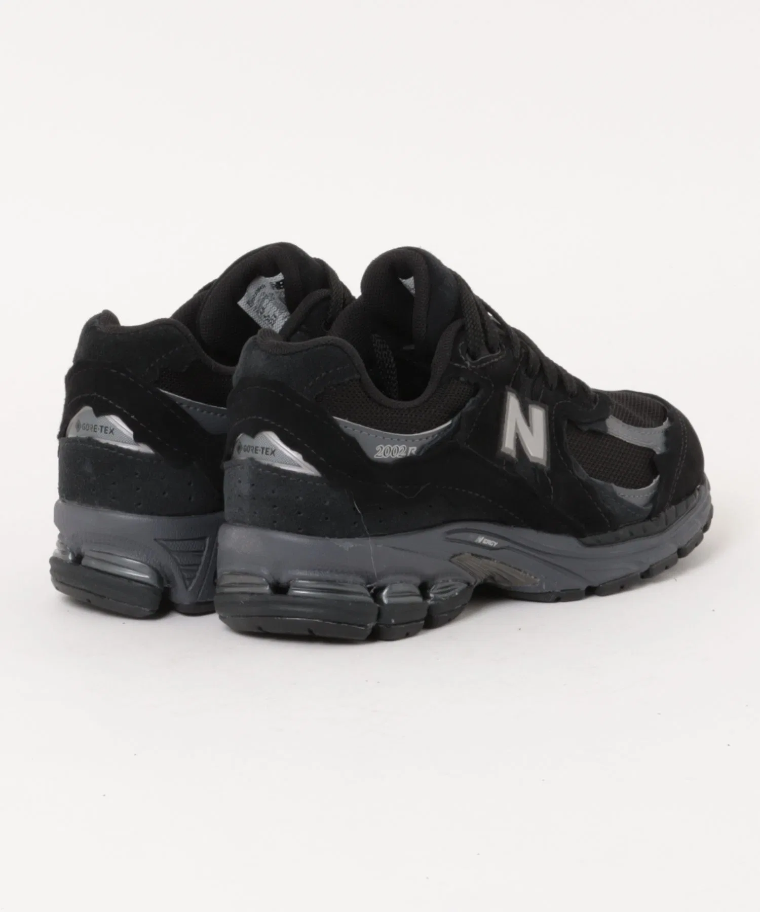 Мужские кроссовки New Balance U2002 из кожи и сетки чёрные — фото 2