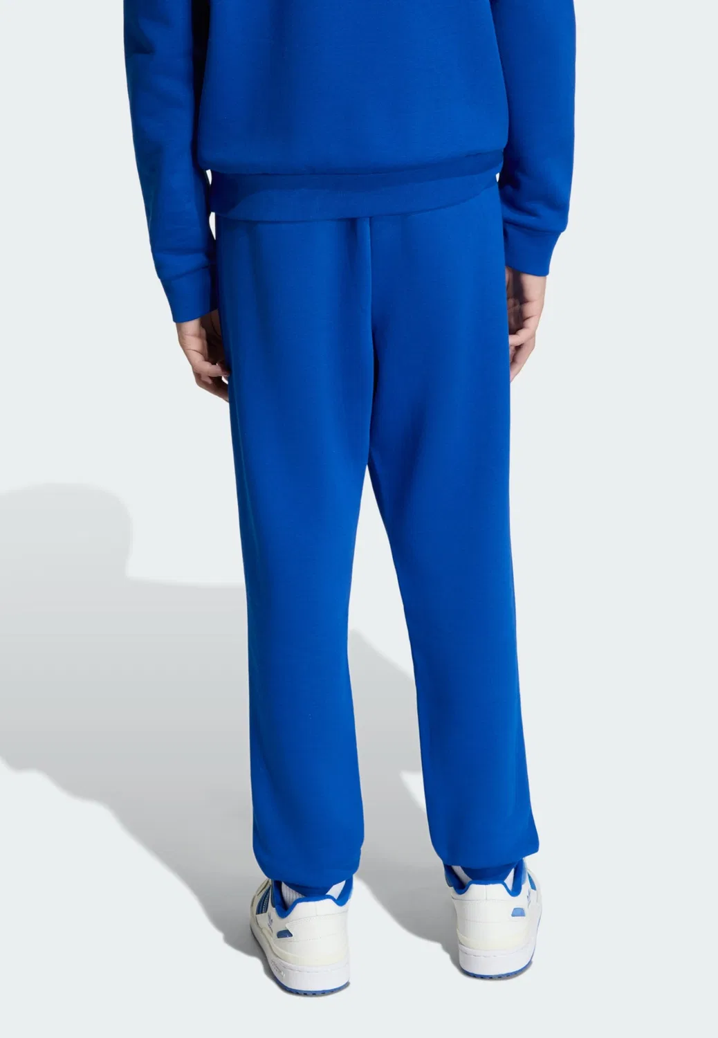 Зауженные брюки Adidas Originals Trefoil Essentials темно-синего цвета — фото 3