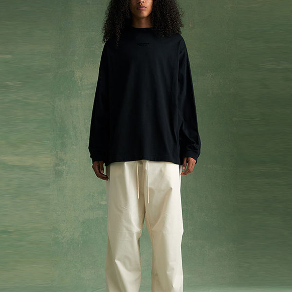 Футболка fw23 long sleeve tee 'jet black' Fear Of God Essentials, черный — фото 4