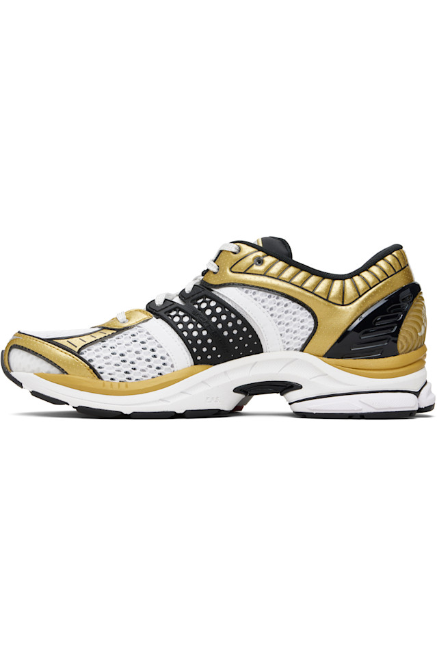 Saucony Кроссовки Progrid Paramount белого и золотого цвета — фото 3
