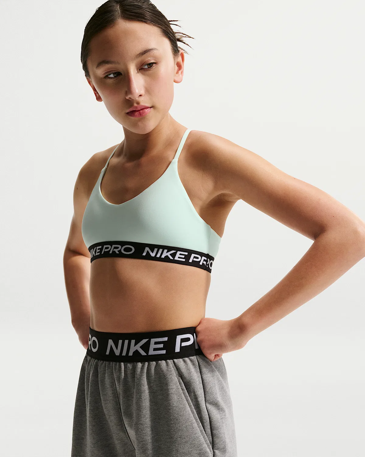 Детский (девичий) бюстгальтер Nike Pro Indy, Barely Green/Black/White