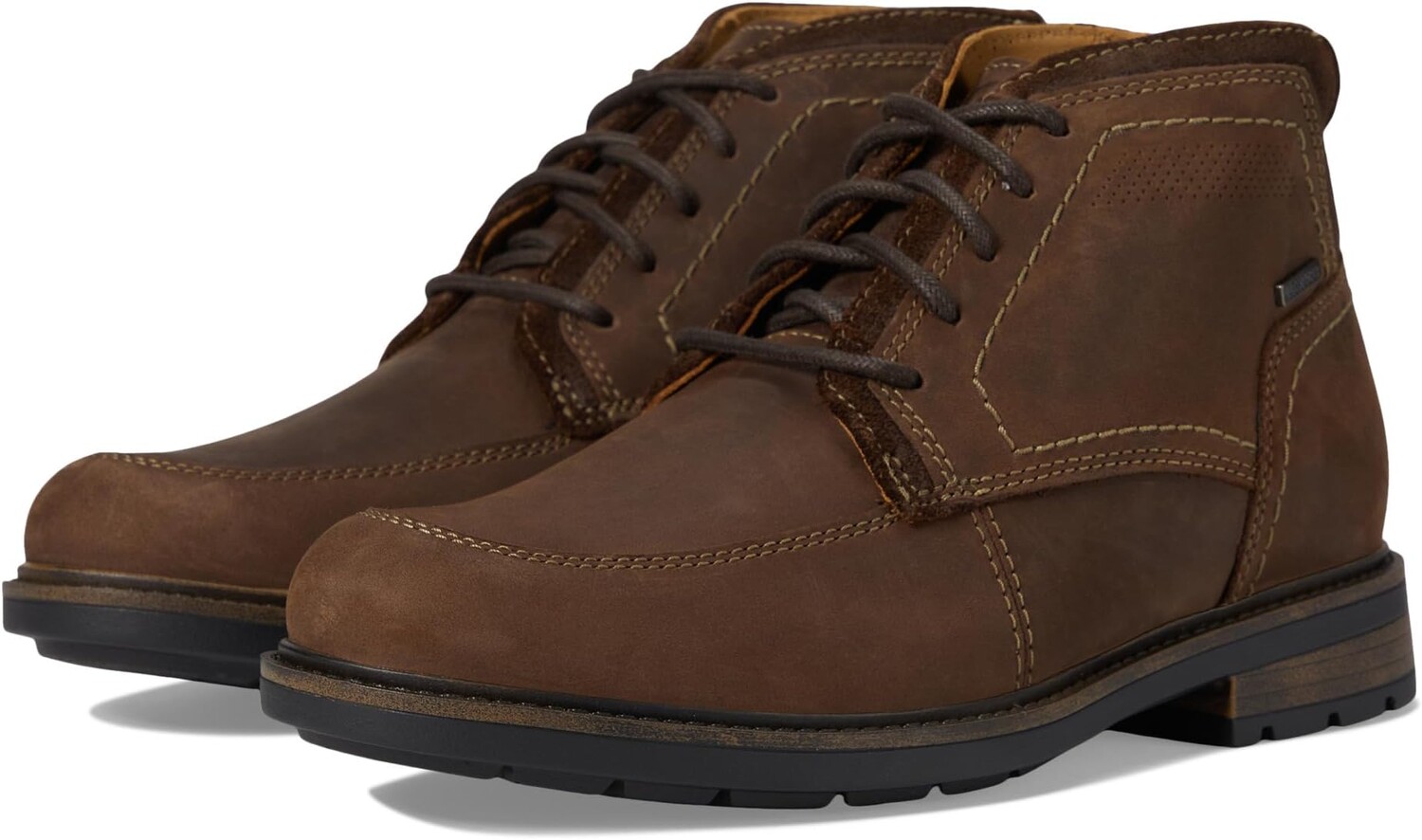 

Ботинки Clarks Un Shire Hi Waterproof, цвет Dark Brown Leather