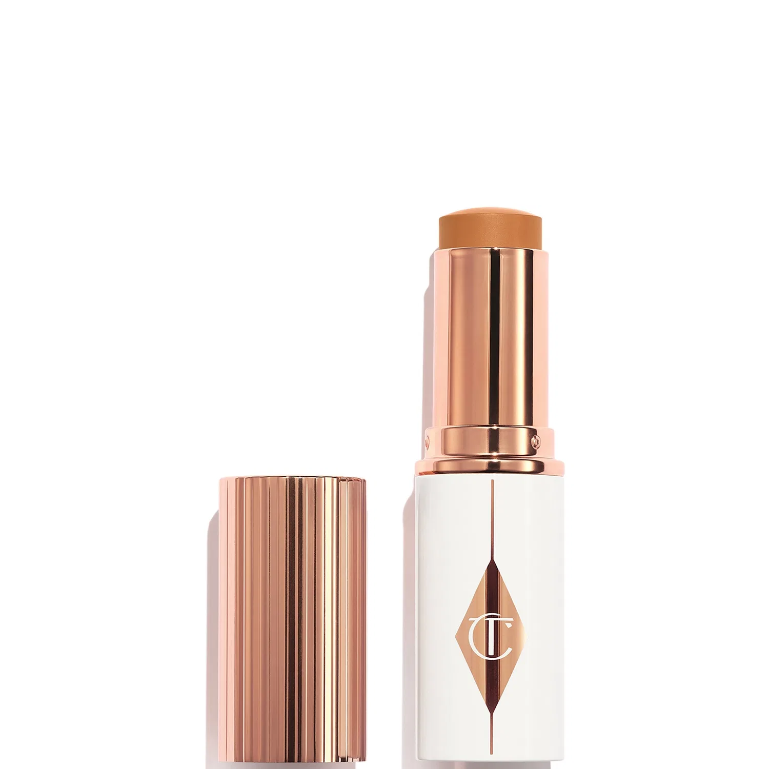 Тональный стик Unreal Skin Sheer Glow Tint Charlotte Tilbury, 10 г, 12 Tan