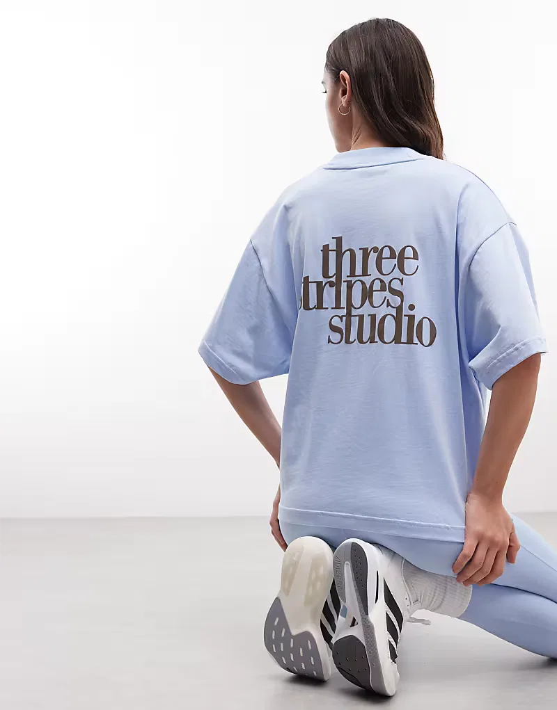 Футболка Adidas Sportswear Three Stripes Studios светло-голубой