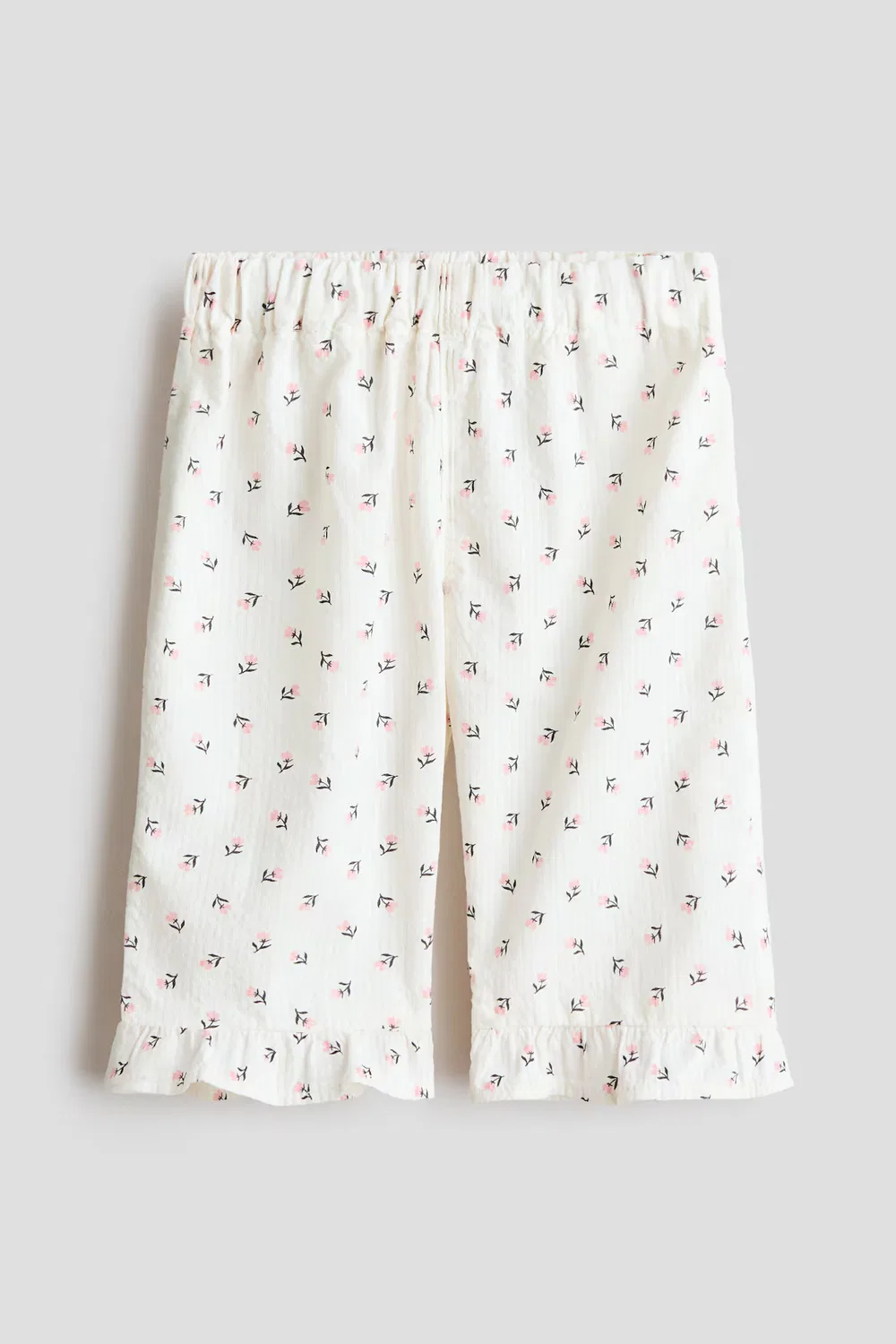 Хлопковые брюки с оборкой H&M, Weiß/Geblümt