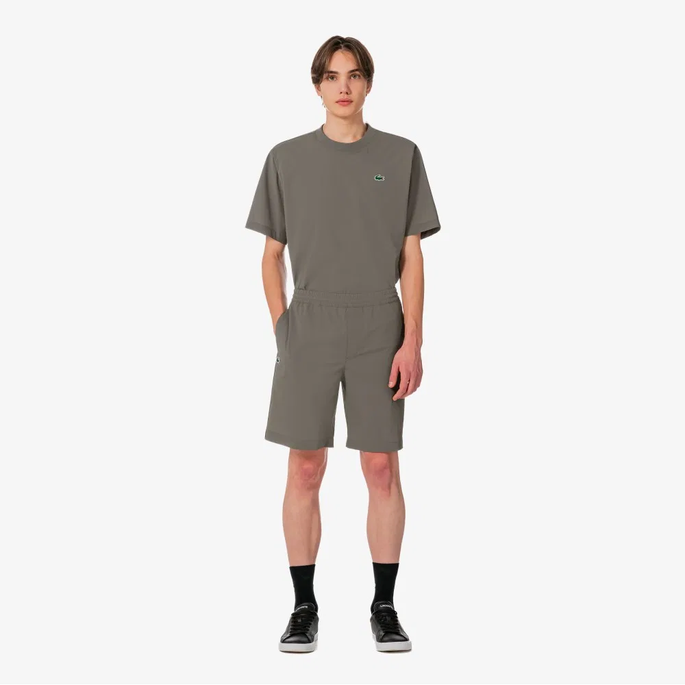 Мужские теннисные шорты цвета хаки от Lacoste