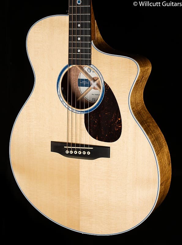 

Martin SC-13E Full Gloss Sitka/Koa (325) SC-13E-01,FG,Sit/KoaVeneer w/Soft Cs (325)