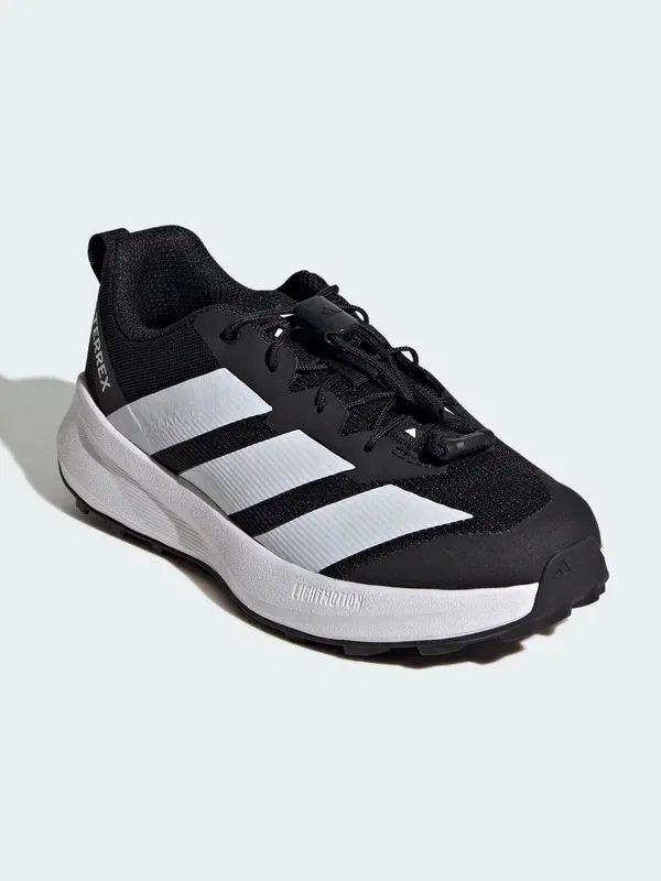 Кроссовки Agravic унисекс для бега по неровным поверхностям Adidas Terrex, белый/черный/оранжевый — фото 2
