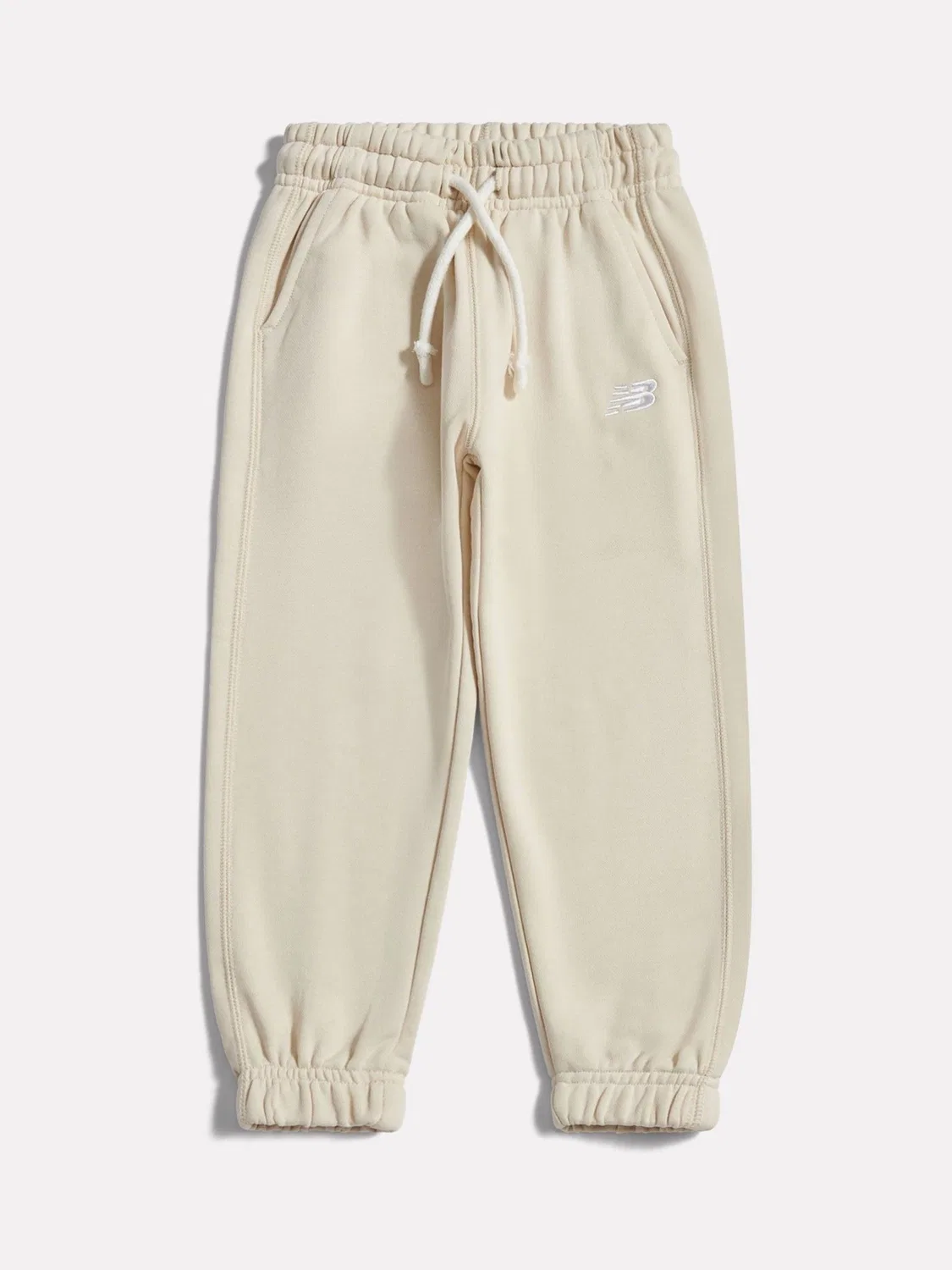 Джоггеры New Balance Natural French Terry Small Logo, натуральный