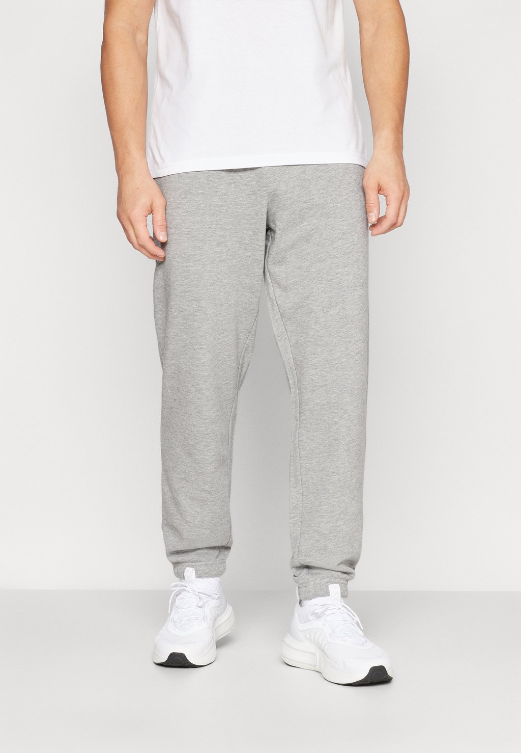 

Спортивные брюки PULSE REGULAR PANTS Hummel, серый