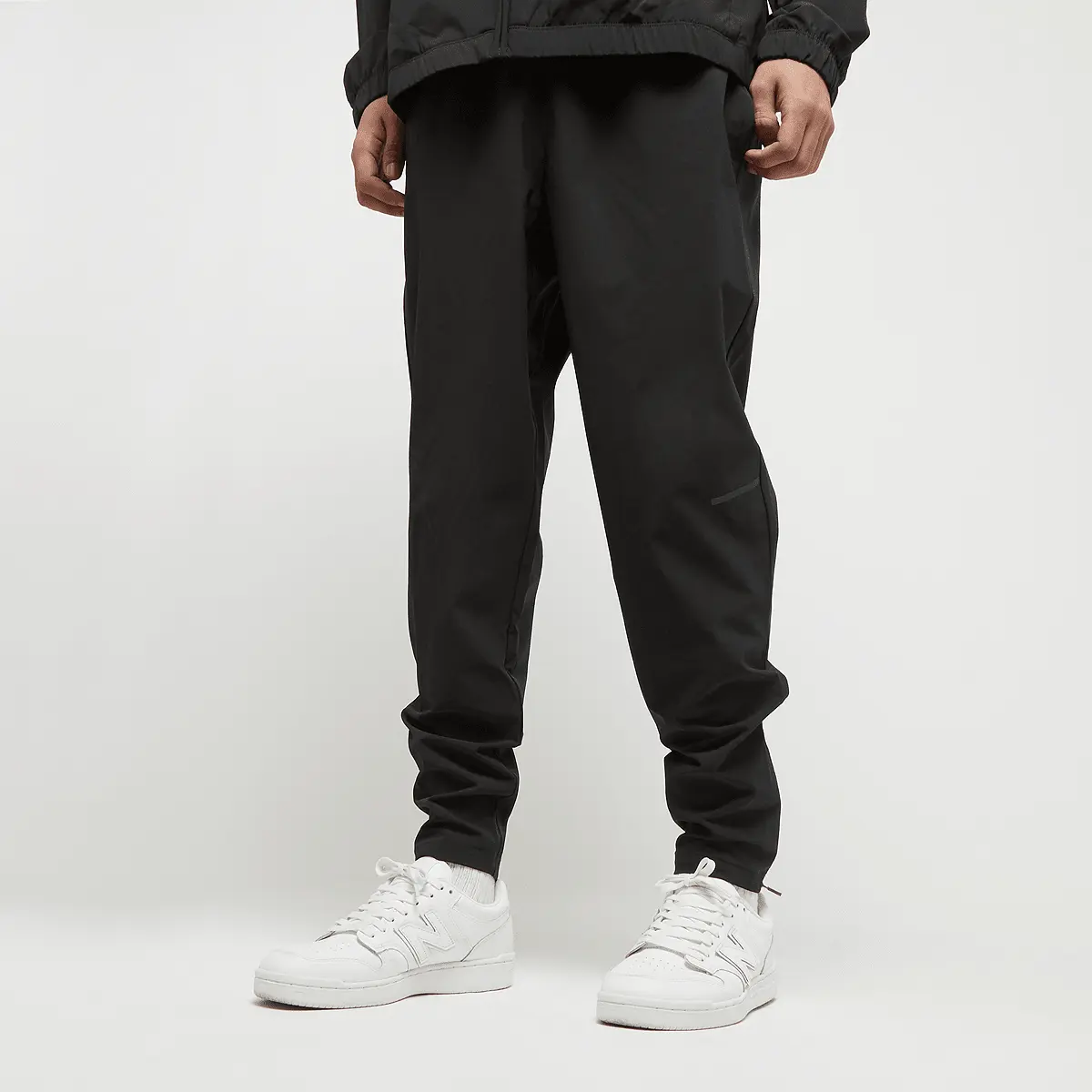 

Спортивные брюки New Balance Active Stretch Woven Slim Pant, черный