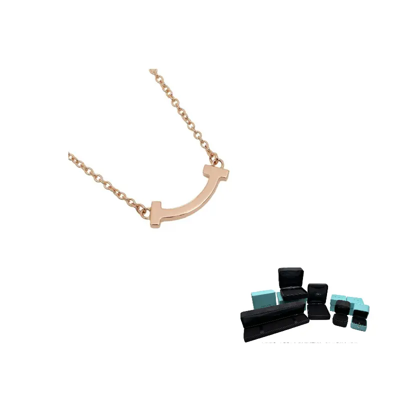 

TIFFANY & CO. Кулон с бриллиантом T Smile Mini из розового золота 18 карат 2010-х годов