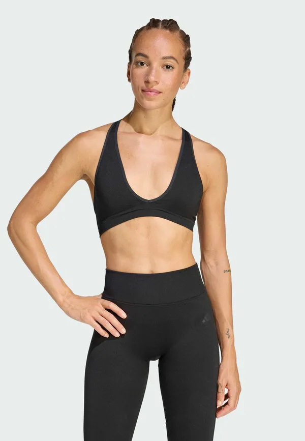 Мы используем спортивный бюстгальтер с легкой поддержкой. Adidas Performance, Black
