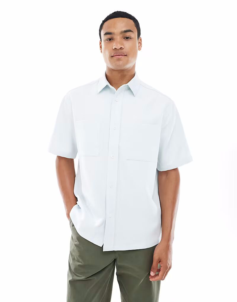 

Свободная рубашка синего цвета с накладными карманами Asos Design