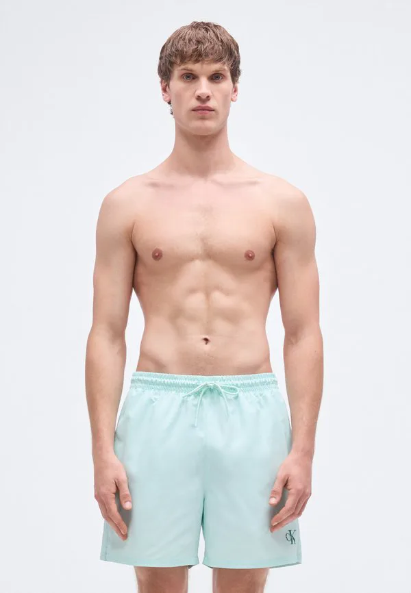 

Плавки средней длины с завязками на поясе и графическим монограммом. Calvin Klein Swimwear, Feel The Mint, Зеленый, Плавки средней длины с завязками на поясе и графическим монограммом. Calvin Klein Swimwear, Feel The Mint