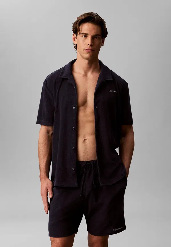 Плавки Calvin Klein Swimwear с длинным шнурком, цвет береговой линии