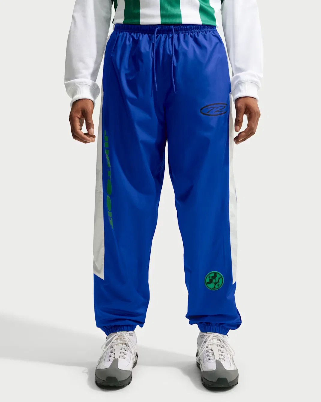 Мужские брюки Storm-FIT с графическим принтом Nike Windrunner, Old Royal/Summit White/Court Green — фото 2