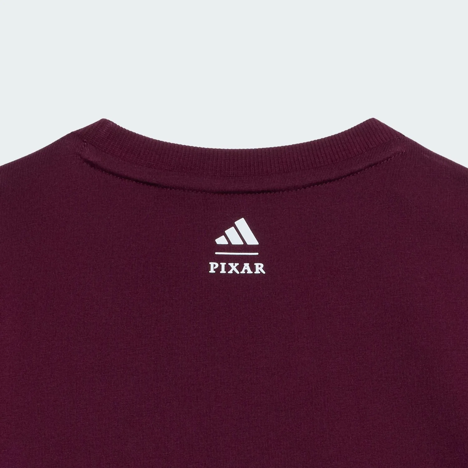 Спортивный костюм Adidas Sportswear История игрушек Pixar красного цвета — фото 4