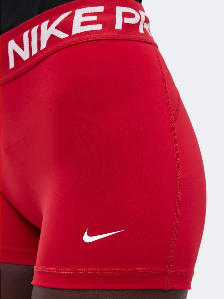 Узкие спортивные брюки NIKE 'NP 365' в неоново-красном цвете — фото 3