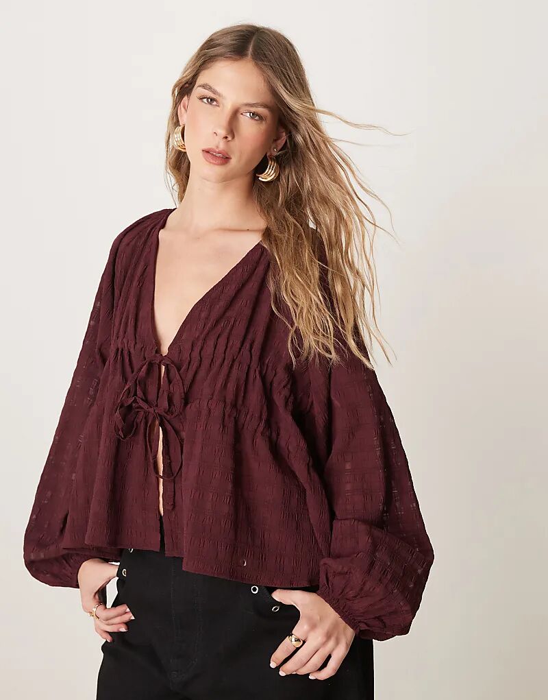 

Фактурная блузка с глубоким вырезом и завязками ASOS DESIGN