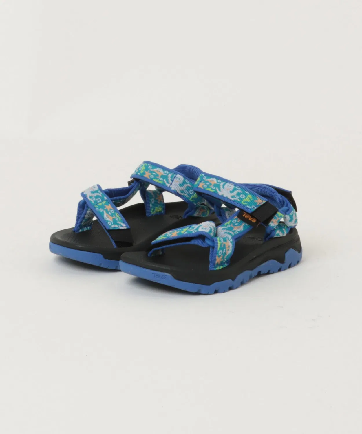 Детские спортивные сандалии с быстросохнущим ремешком Teva T Hurricane XLT JR, Black/Blue