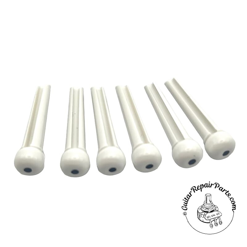 

Пластиковые штифты для акустической гитары (6 шт.) - белые w. Черная точка Allparts BP-0679-025 Acoustic Guitar Plastic Bridge Pins set of 6