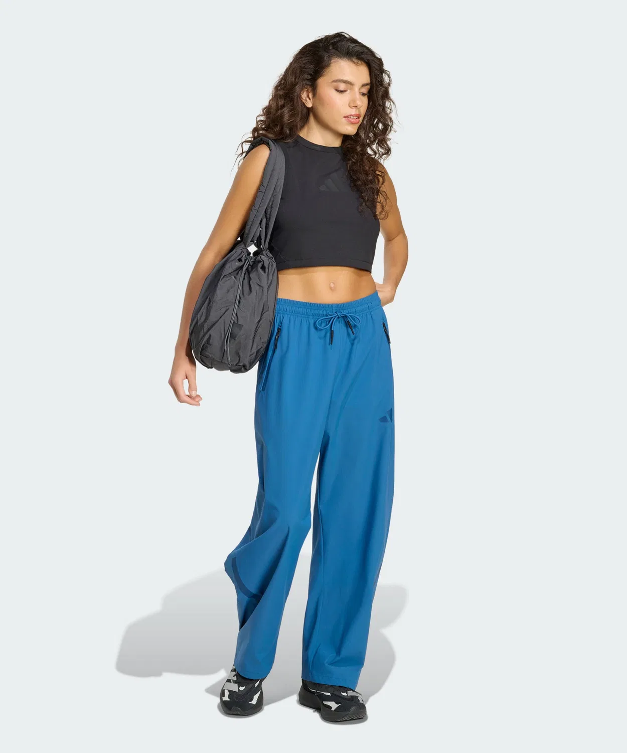 Женские спортивные брюки свободного кроя с рипстоп-тканью Adidas Z.N.E. Woven Pants, Blue — фото 4