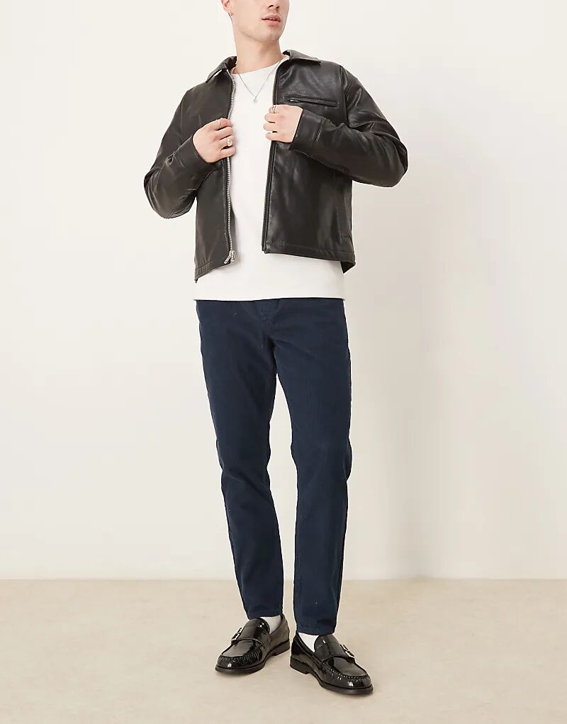 

Зауженные брюки вельветового кроя в темно-синем цвете ASOS DESIGN