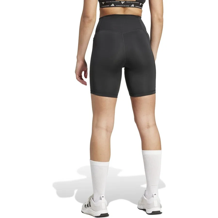 Леггинсы-шорты с карманом Optimé Essentials Stash Pocket 7-Inch Short Leggings adidas, Черный — фото 2