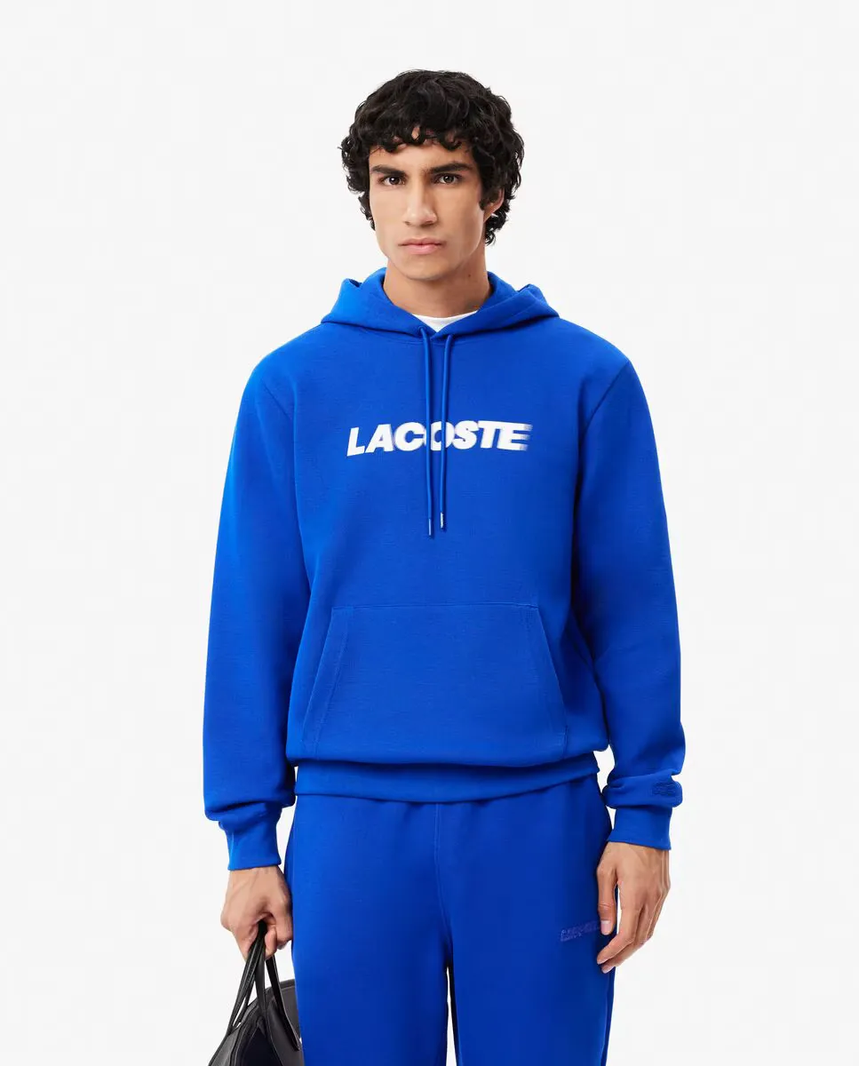 

Мужская толстовка с капюшоном синего цвета с принтом Lacoste