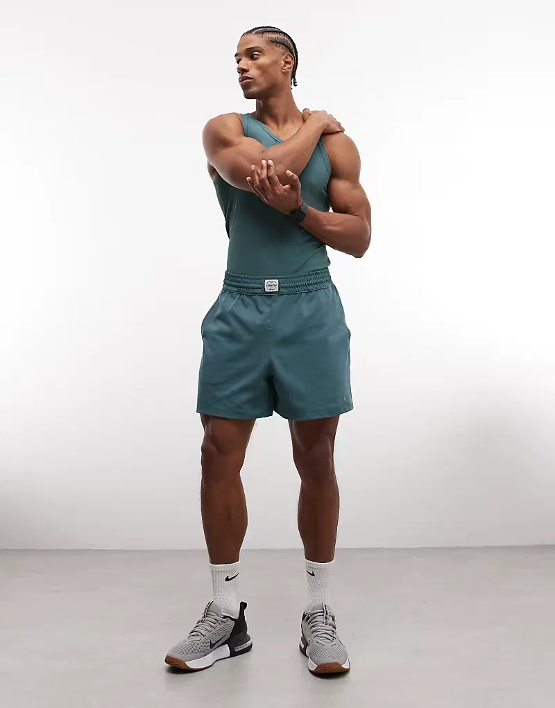 Вязаные шорты Nike с эластичным поясом, зеленого