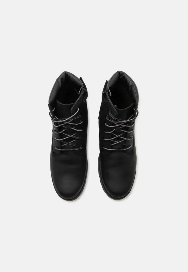 Ботинки кожаные Courma kid mid lace boot unisex Timberland, черный — фото 4