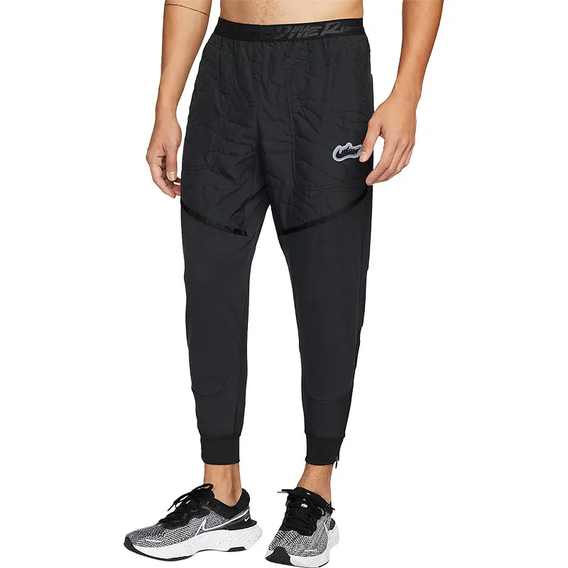 

Nike Вязаные спортивные штаны мужские черные, средней высоты с манжетами