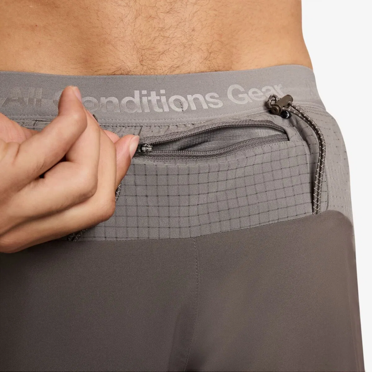 Мужские шорты беговые с интегрированным бельем Nike ACG Dri-FIT ADV Second Sunrise 5in Brief Short, Ironstone/Cave Stone/Summit White — фото 2