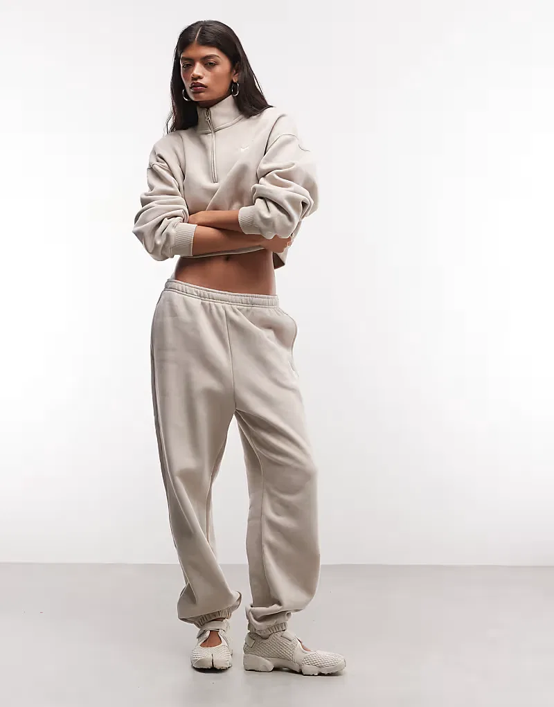 Спортивные брюки Nike Studio Fleece с отворотами, бежевый
