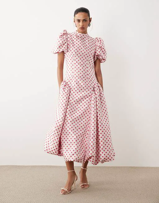 

Розовое платье миди с жаккардовыми рукавами и объемным подолом Dream Sister Jane в горошек