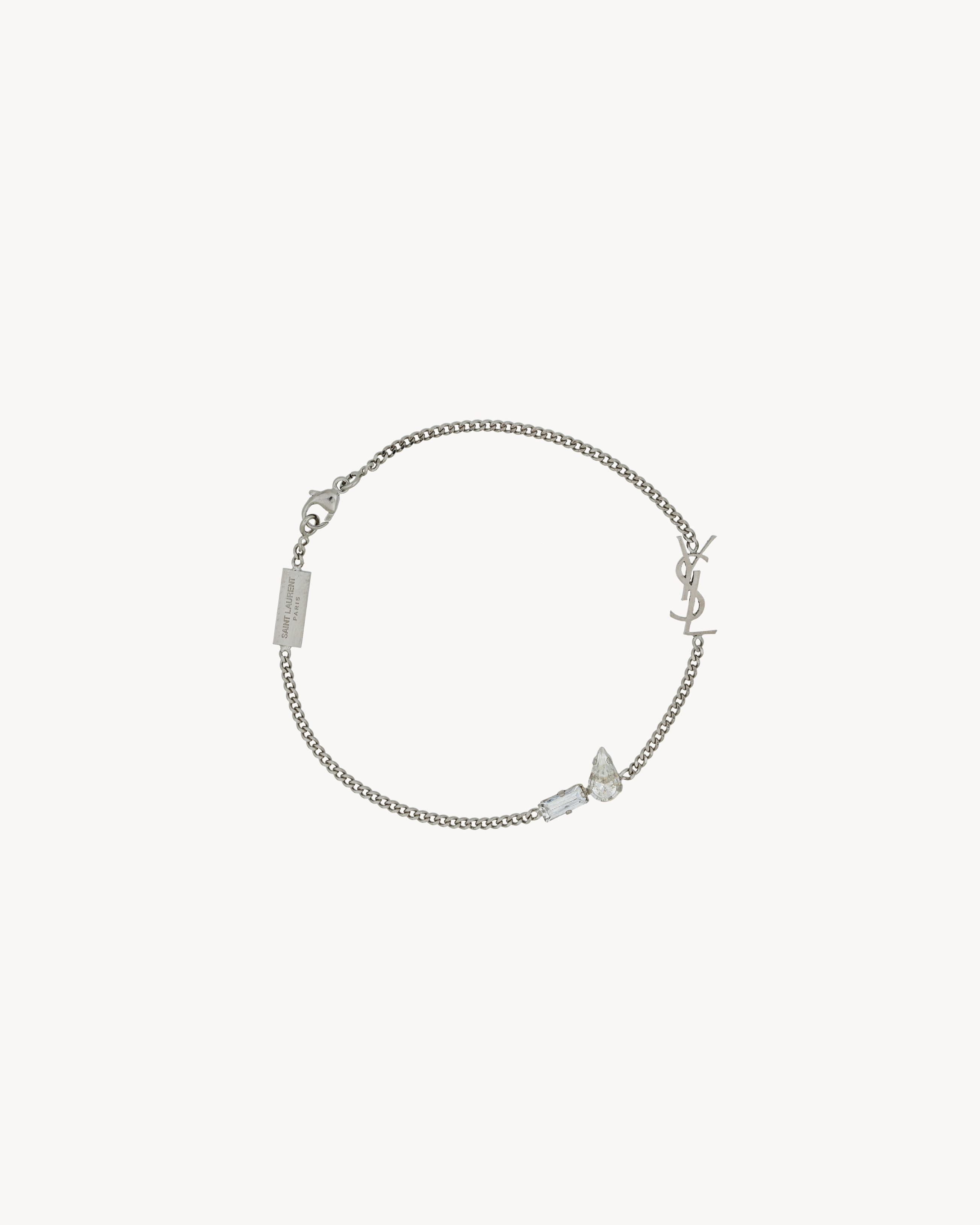 

Браслет-брелок CASSANDRE из металла и стразов Saint Laurent, серебро