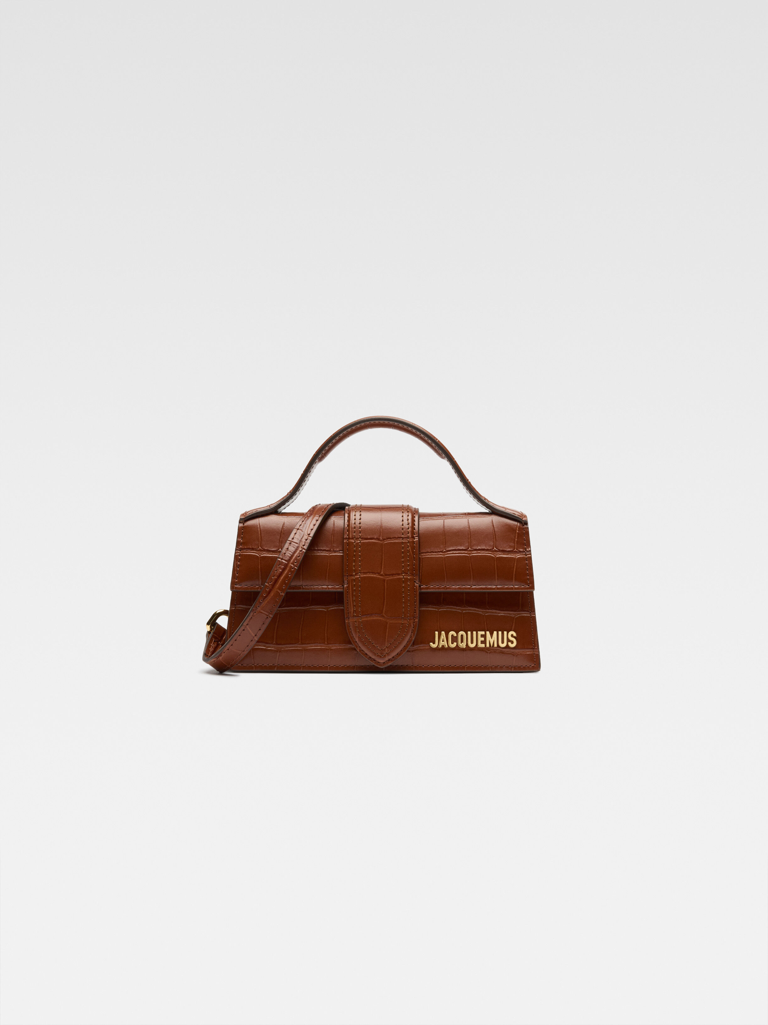 

Мини-сумка с клапаном JACQUEMUS The Bambino, коричневый