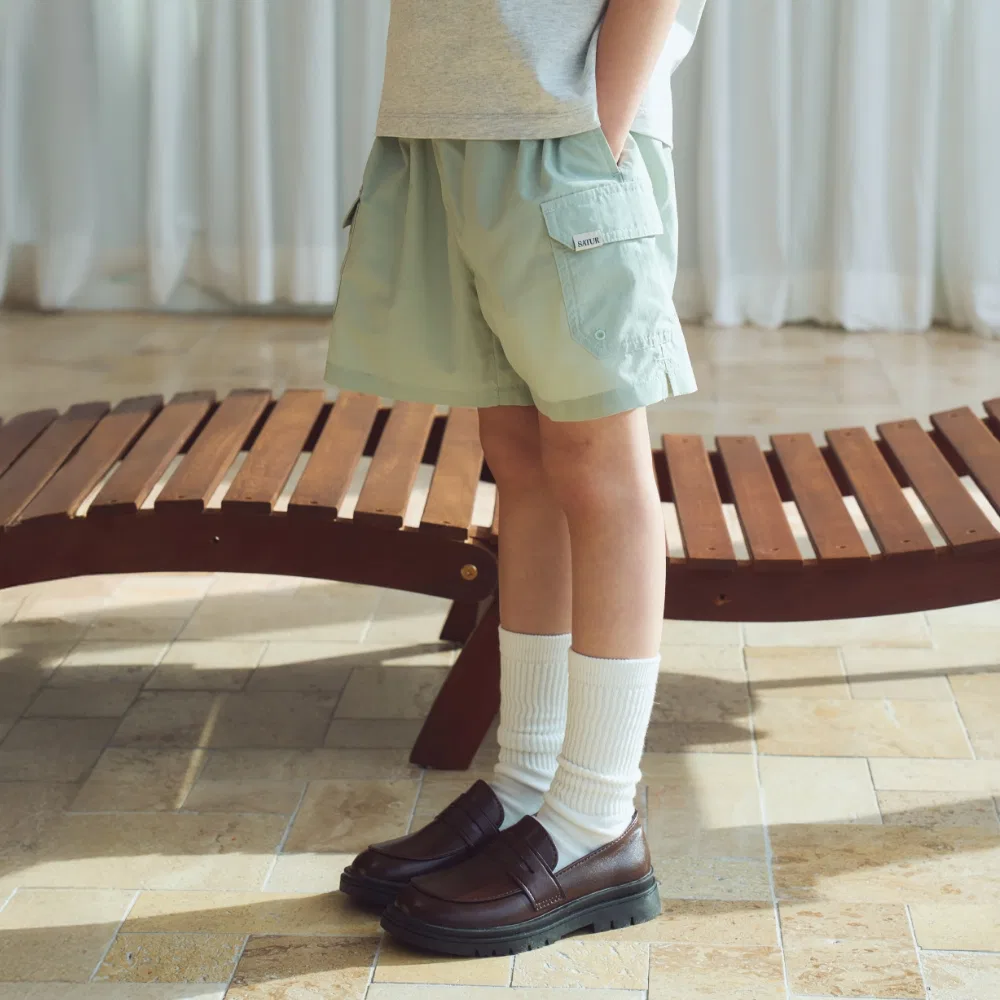 Детские нейлоновые шорты карго зелёные от Satur Kids