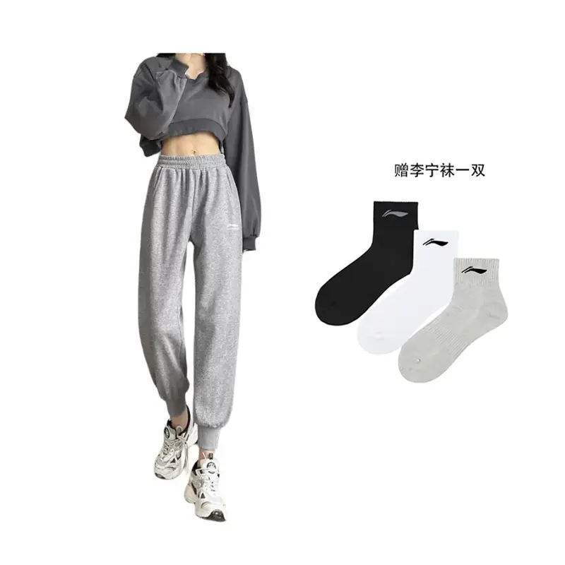 

Трикотажные спортивные брюки женские LINING, серый