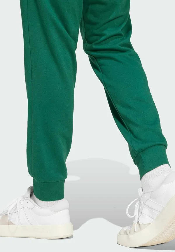 Основные элементы комфортного спортивного костюма: уютные штаны. Adidas Sportswear, Collegiate Green Black — фото 4