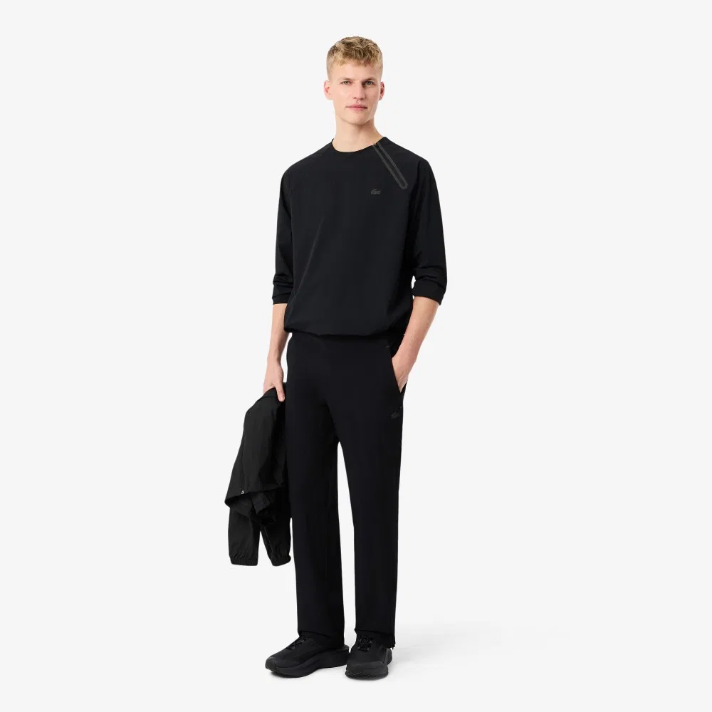 Мужские чёрные брюки из тканого материала от Lacoste