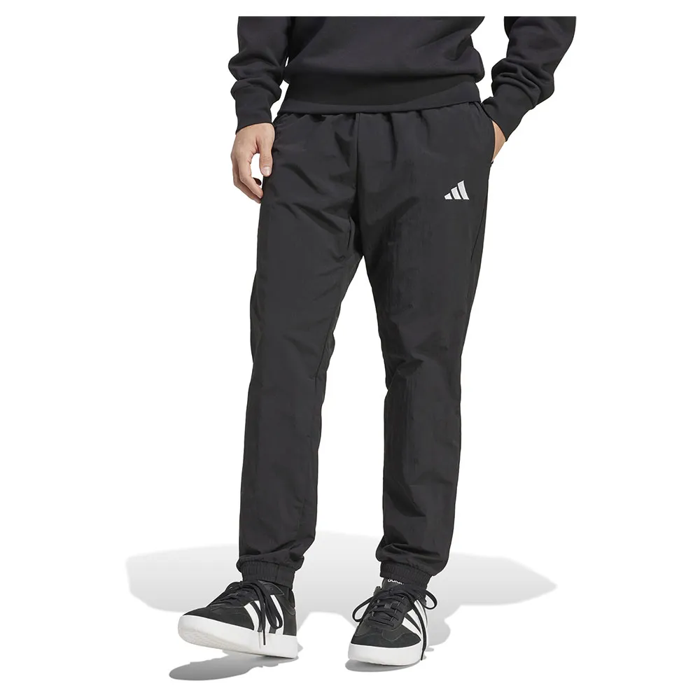 

Брюки adidas Essential Small Logo Woven, черный
